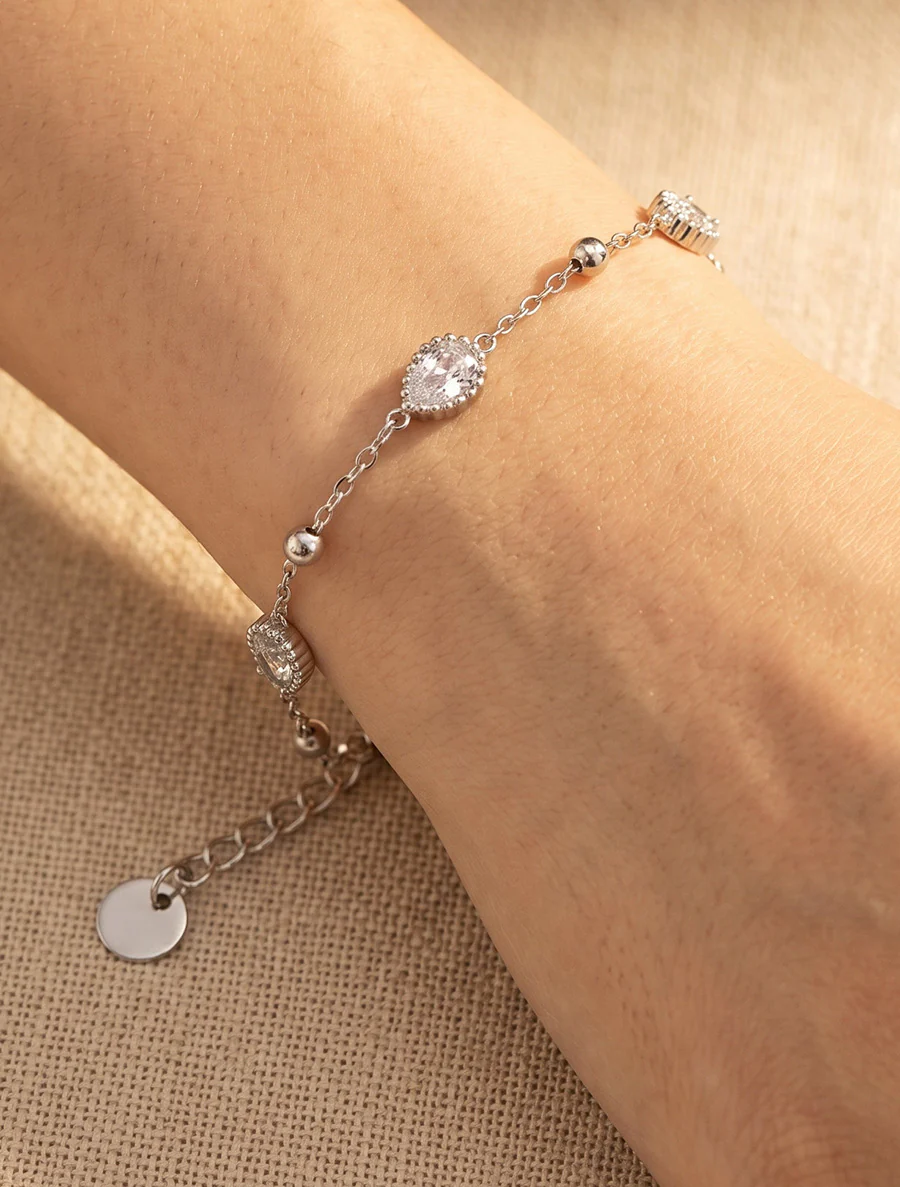Armband met druppels versierd met zirkonia. - Geld