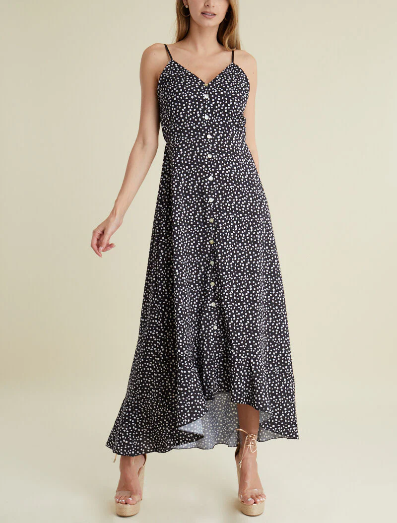 Asymmetrische basque-jurk met polkadotprint - zwart