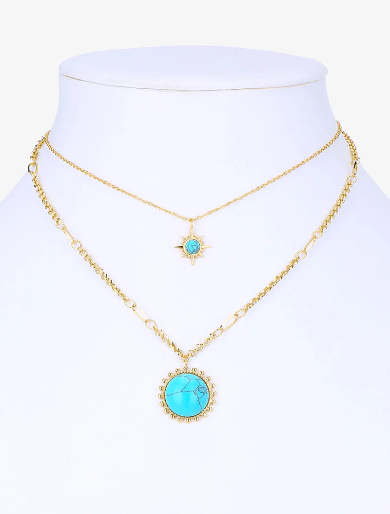 Gelaagde ketting met gestileerde gemarmerde zonnen - goud/turkoois