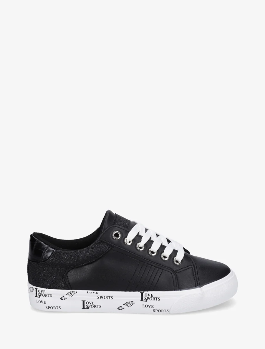 Effen sneakers met een flockzool - Zwart