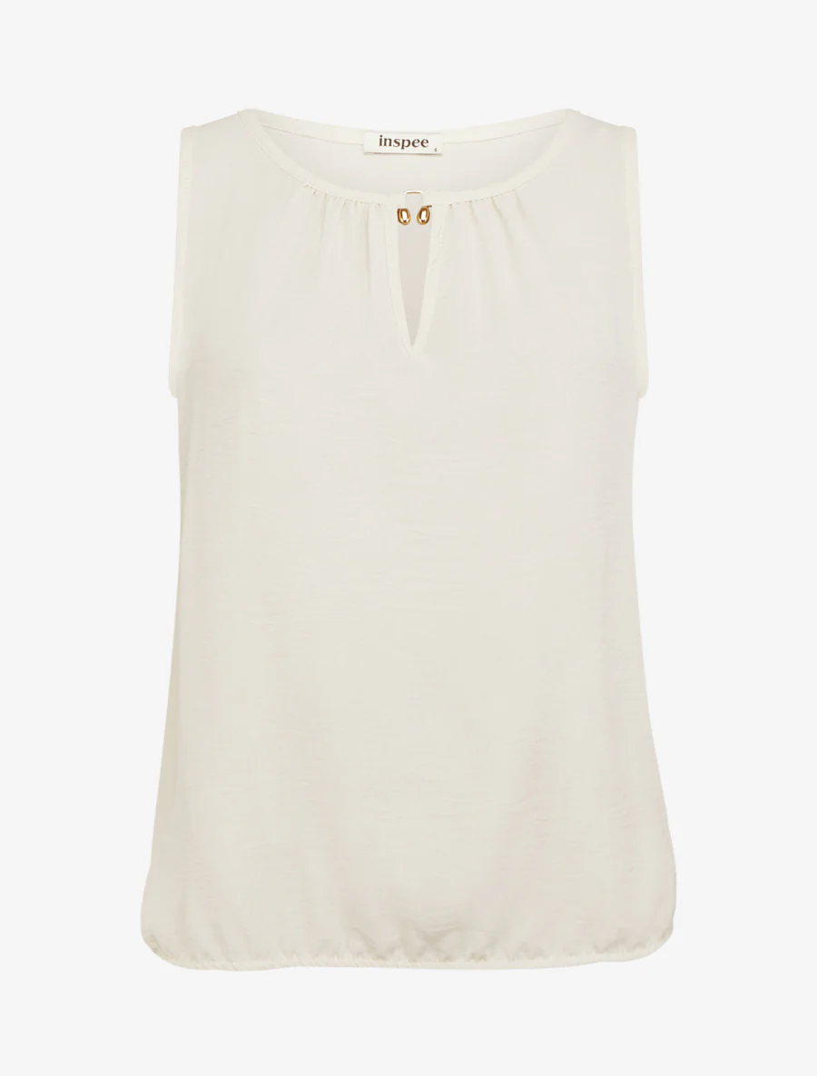 Elastische top met sierstuk. - Beige