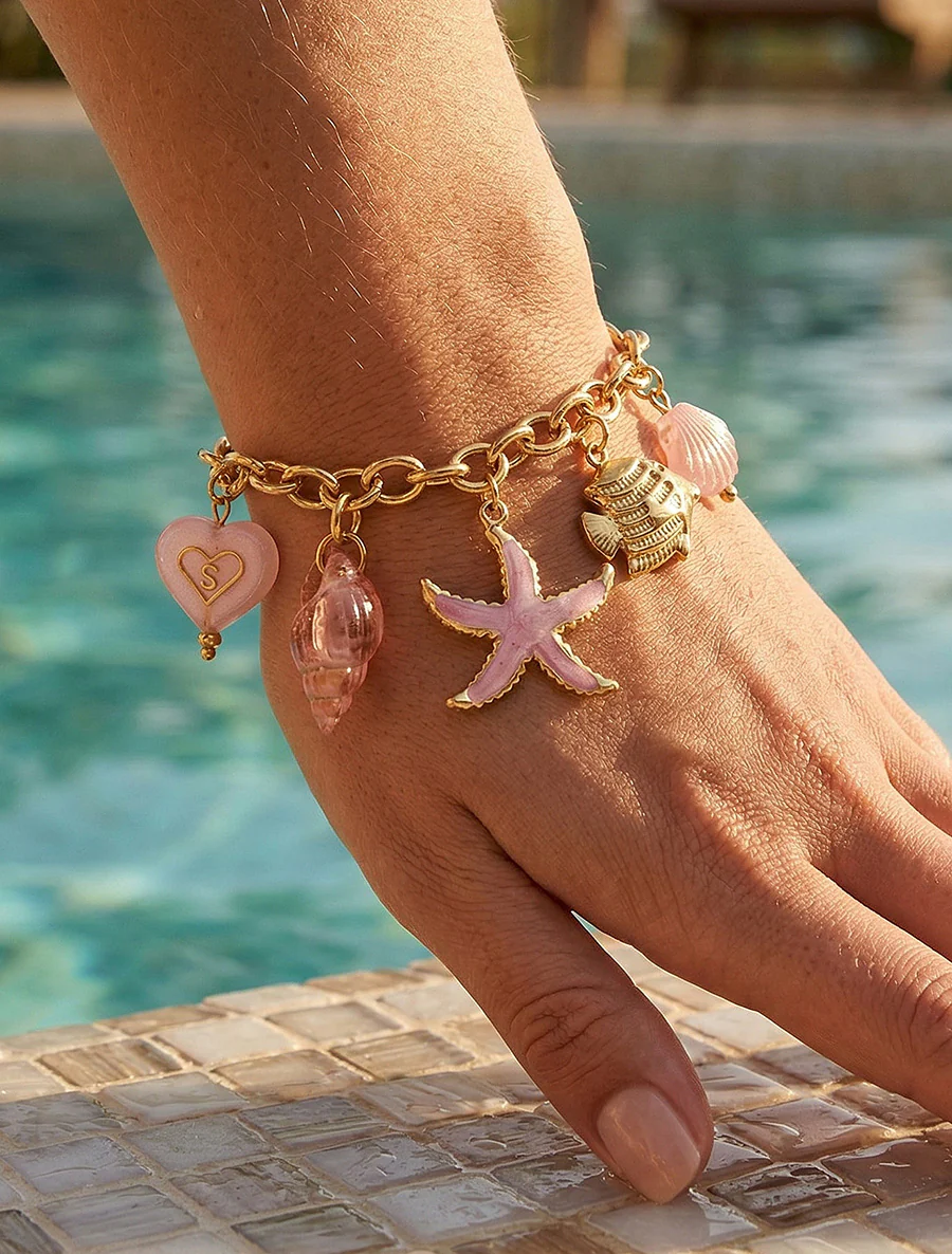 Fantaisie armband met maritiem motief en hart - Roos