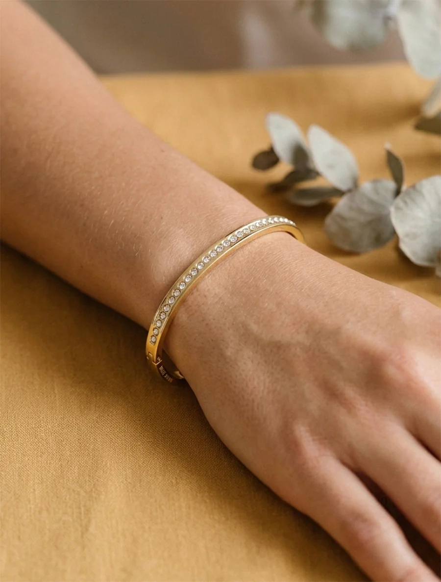 Fijne armband met witte zirkonen - Goud