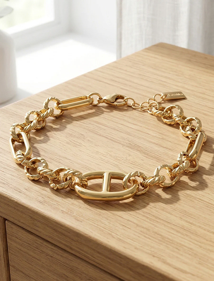 Gedraaide fantasie schakelarmband - Goud