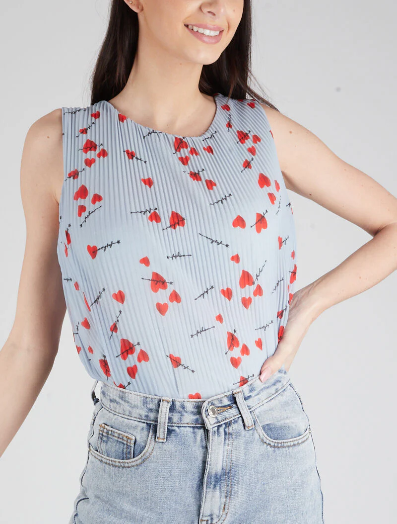 Gegolfd top met prints - lichtblauw