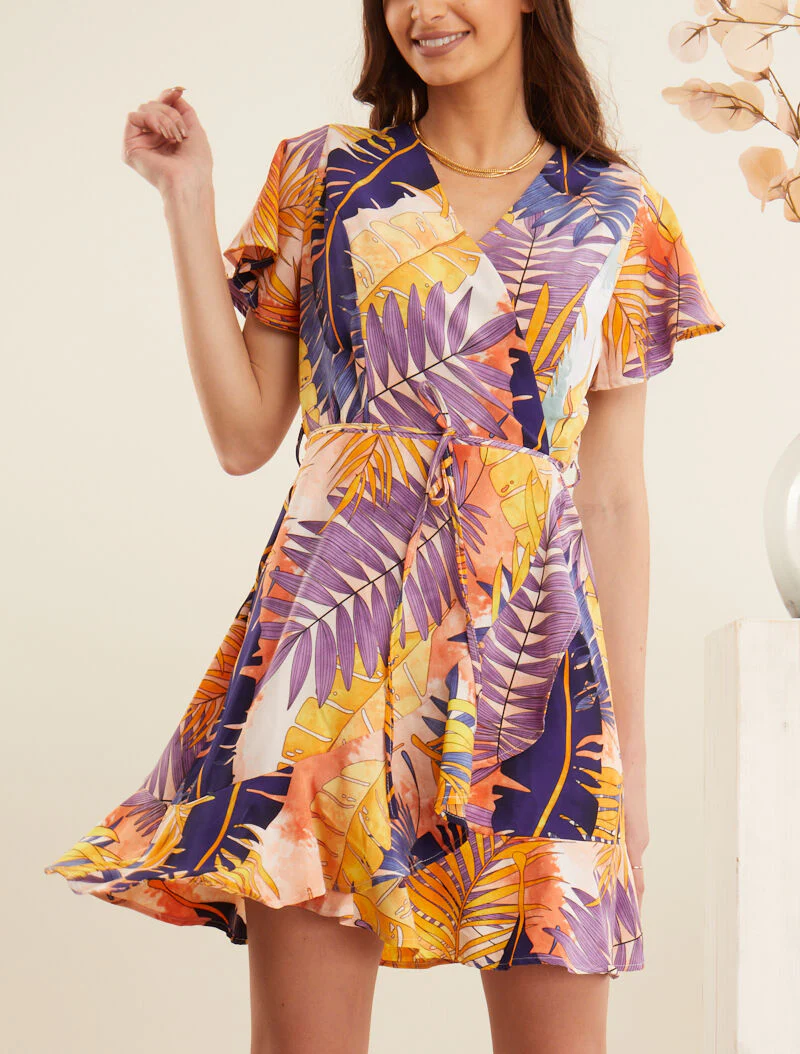 Jurk in wikkelstijl met zomerse print - oranje
