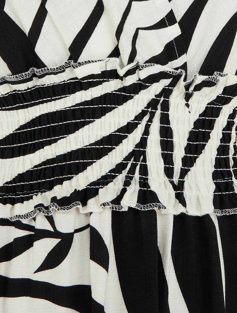 Jurk met bladerenprint en knoopbandjes - Zwart - Image 3