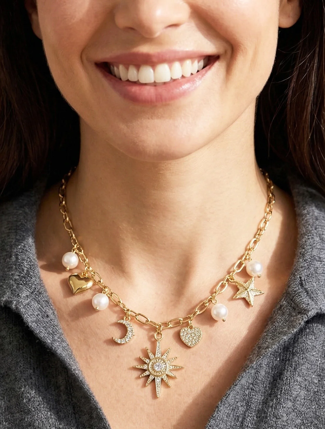 Ketting met zon- en hartjesbedeltjes - Goud