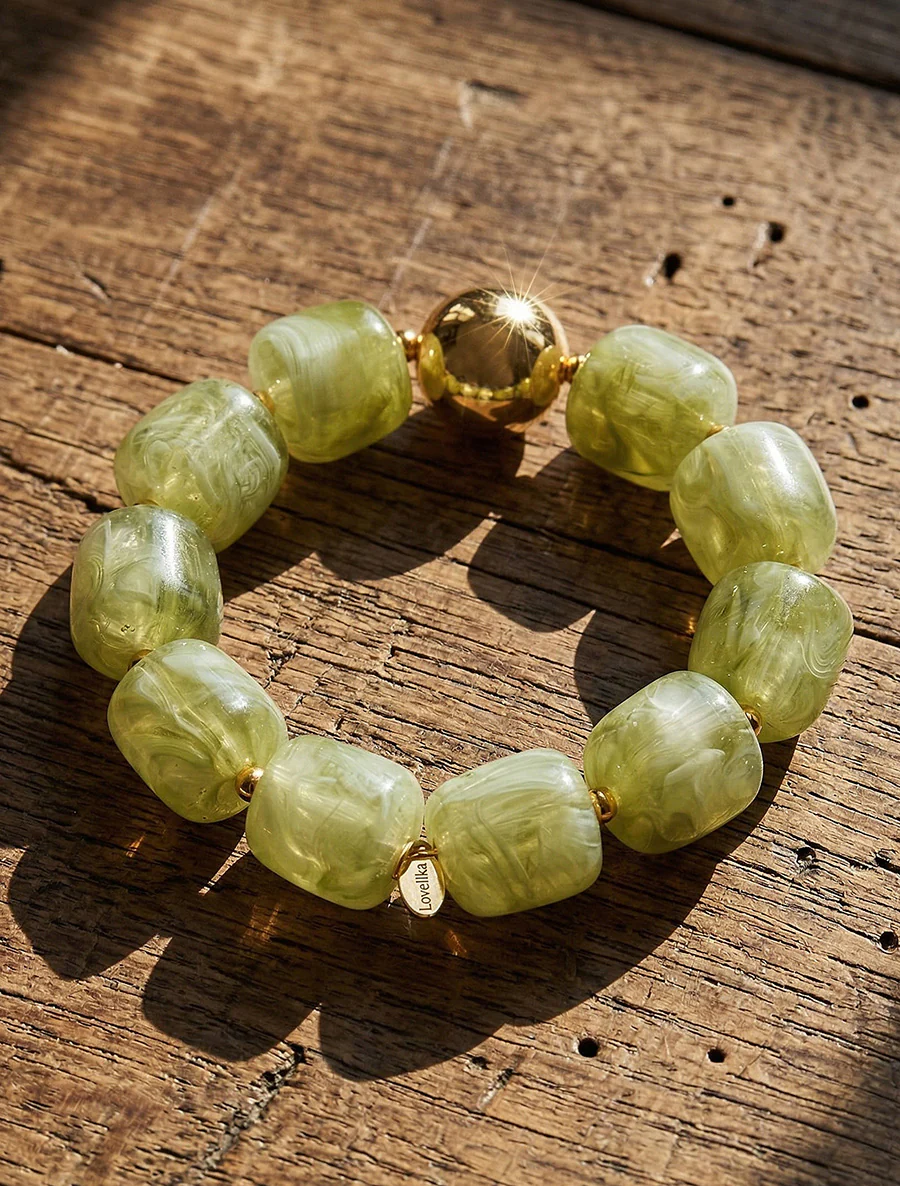 Kralenarmband van hars en metaal - Groen