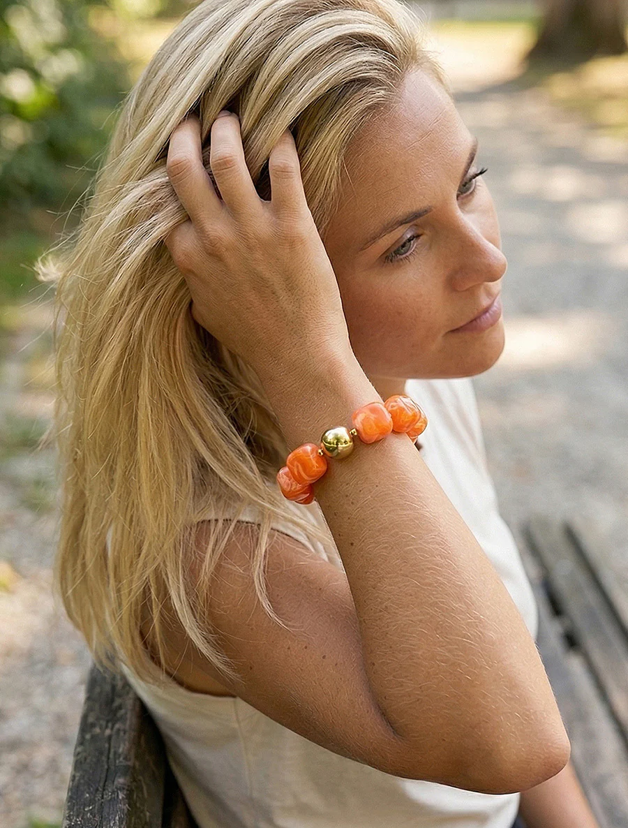 Kralenarmband van hars en metaal - Oranje
