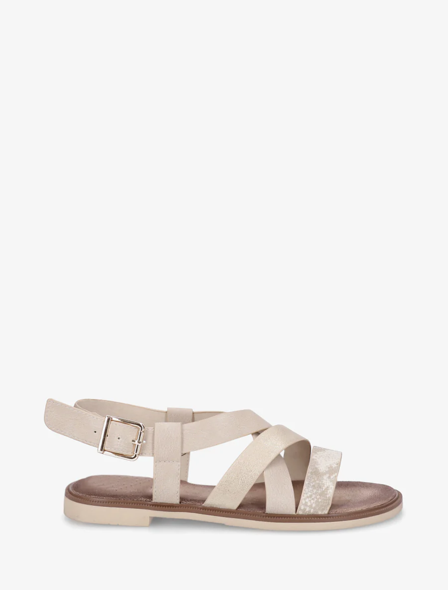 Kruisband sandalen met een iriserend effect in imitatie. - Beige