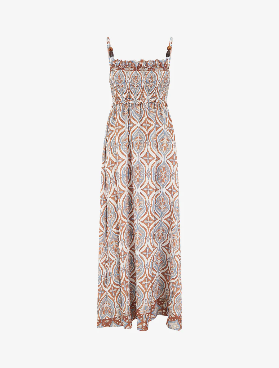 Lange jurk met parelbandjes en fantasieprint. - Beige