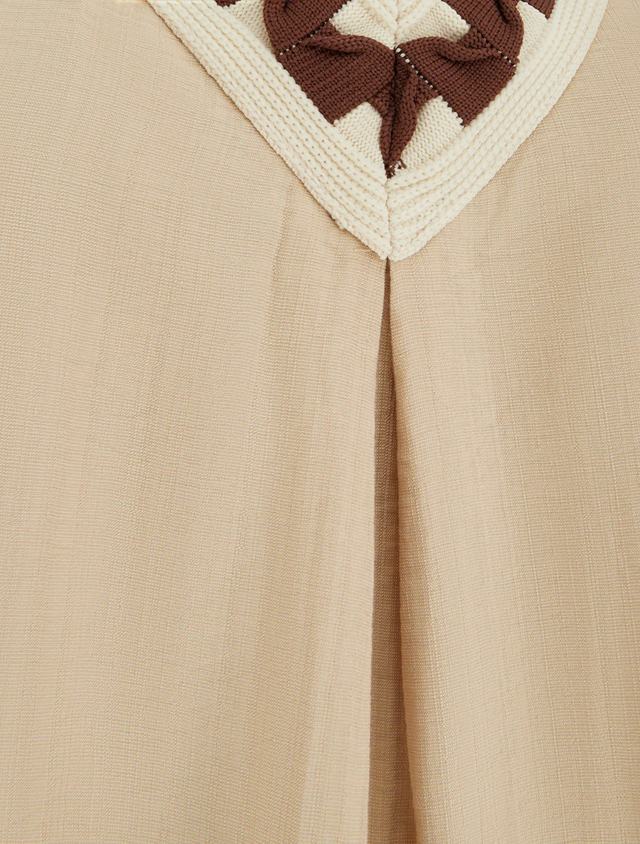 Mouwloze top met V-hals en stijlvol ontwerp. - Beige - Image 3