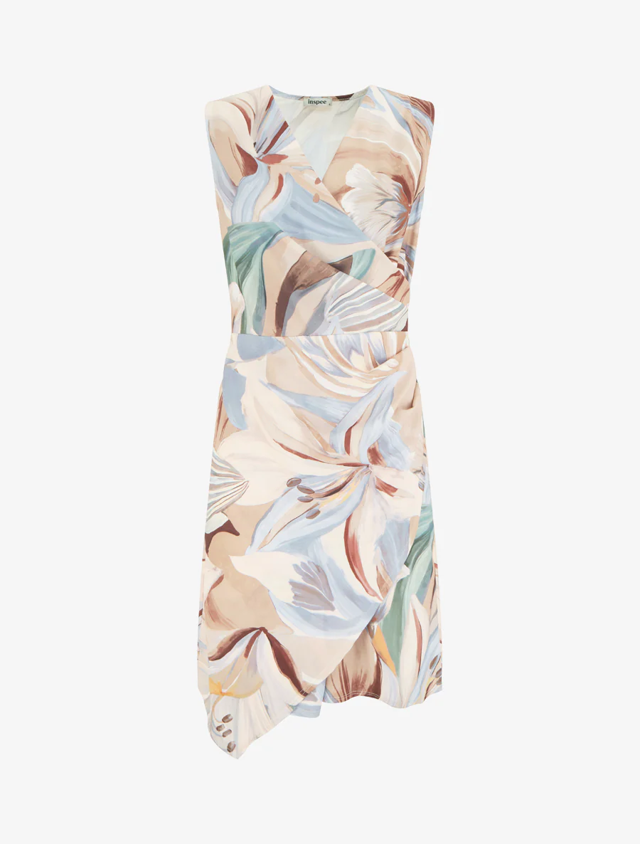 Mouwloze wikkeljurk met leliebloemenprint. - Beige