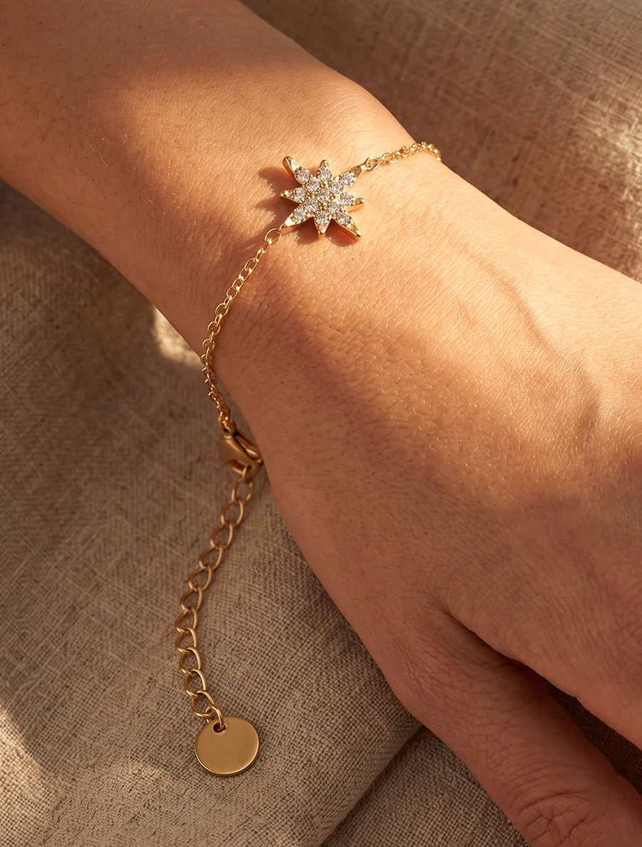 Noordster armband versierd met witte zirkonia's - Goud