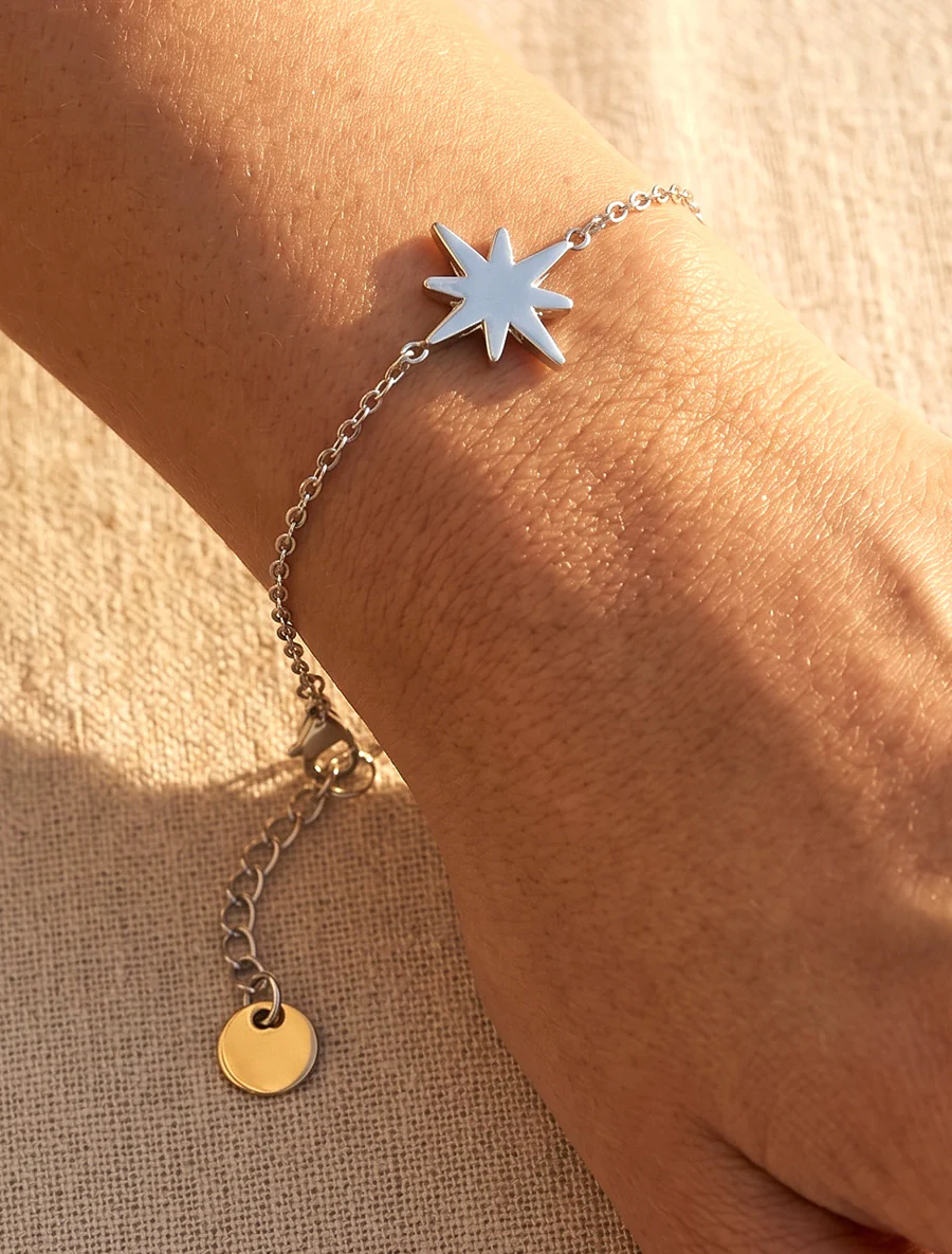 Noordster armband versierd met witte zirkonia's - Geld