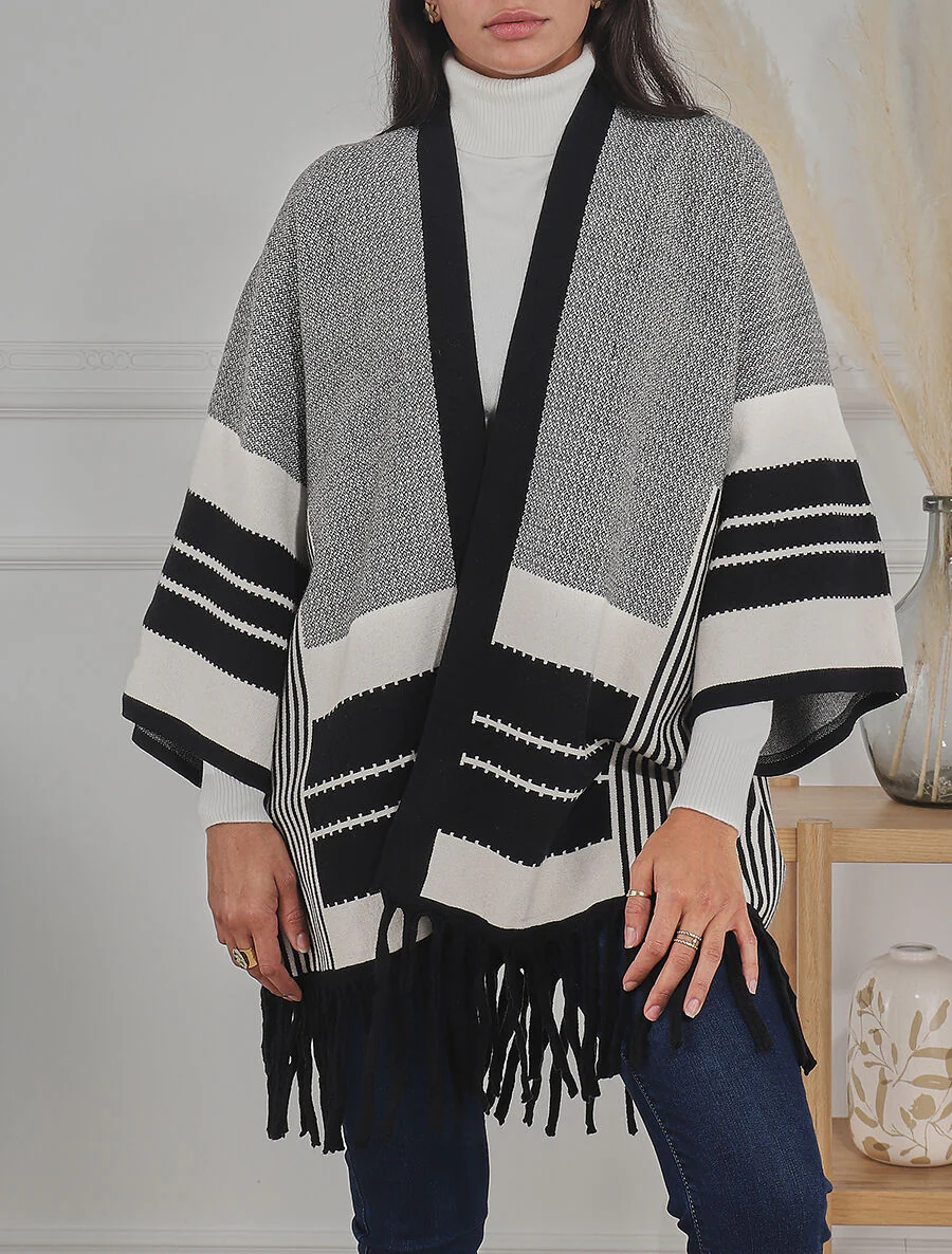 Poncho met grafische print en franjes - zwart