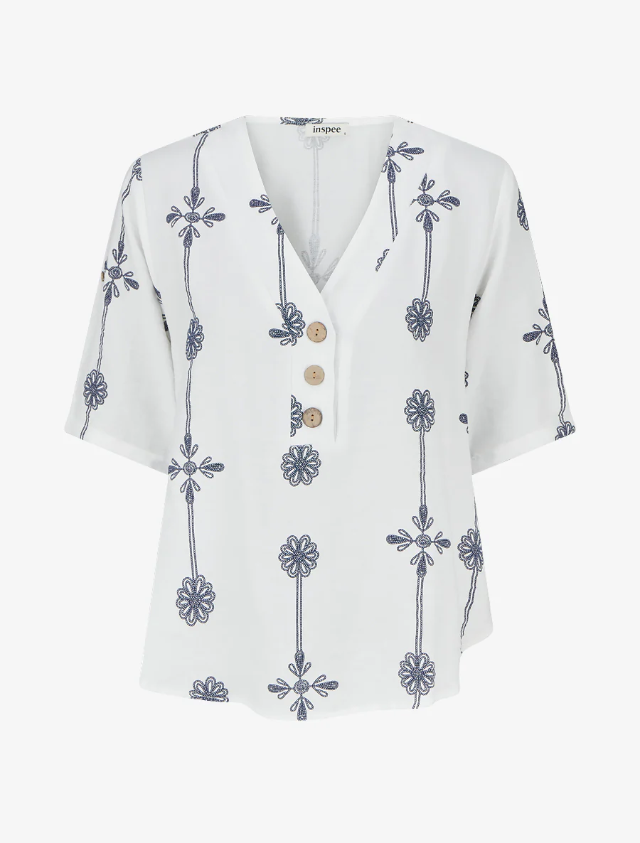 Ruimvallend top met korte mouwen en bloemenprint - Wit