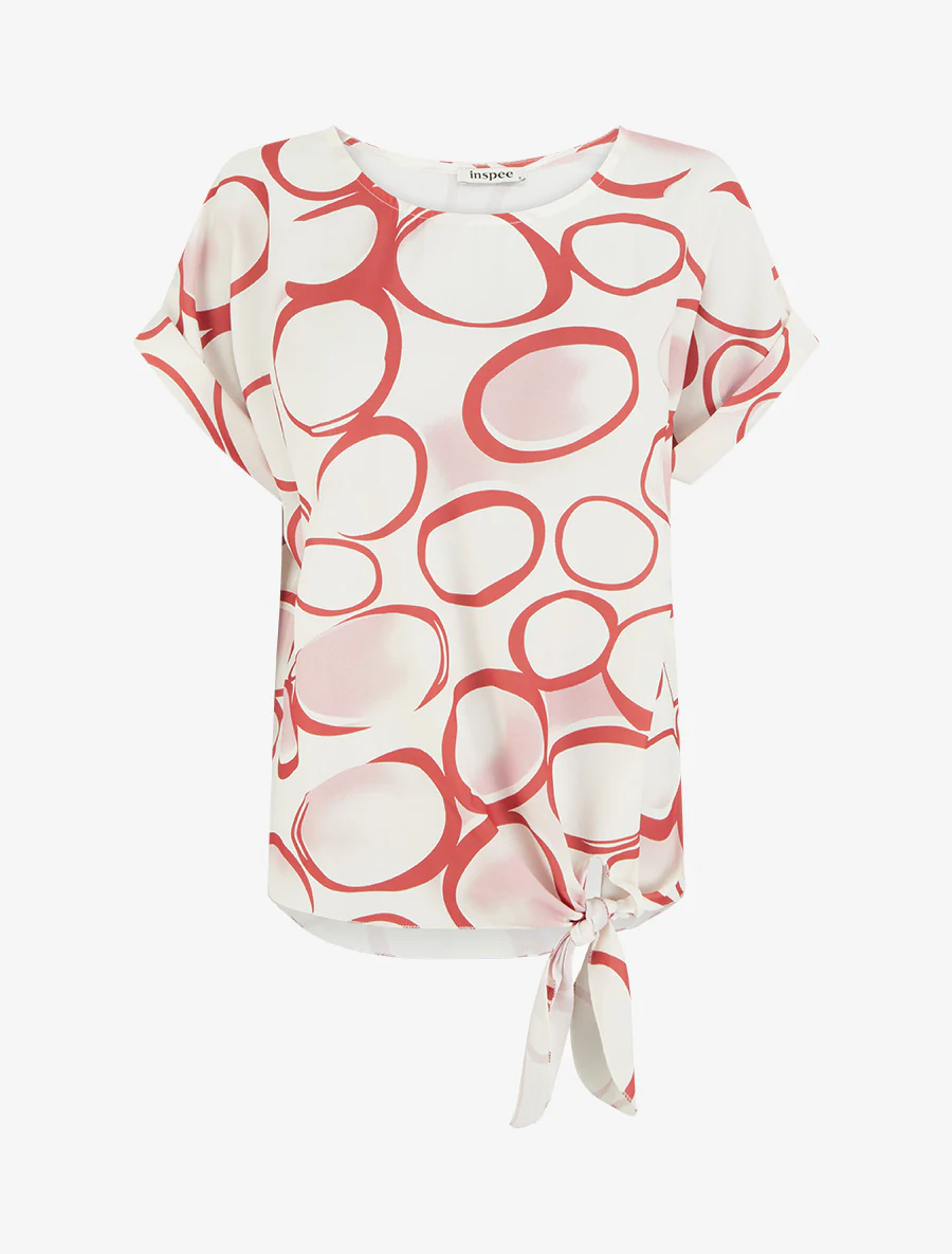 Ruimvallende top met korte mouwen en cirkelprint. - Rood