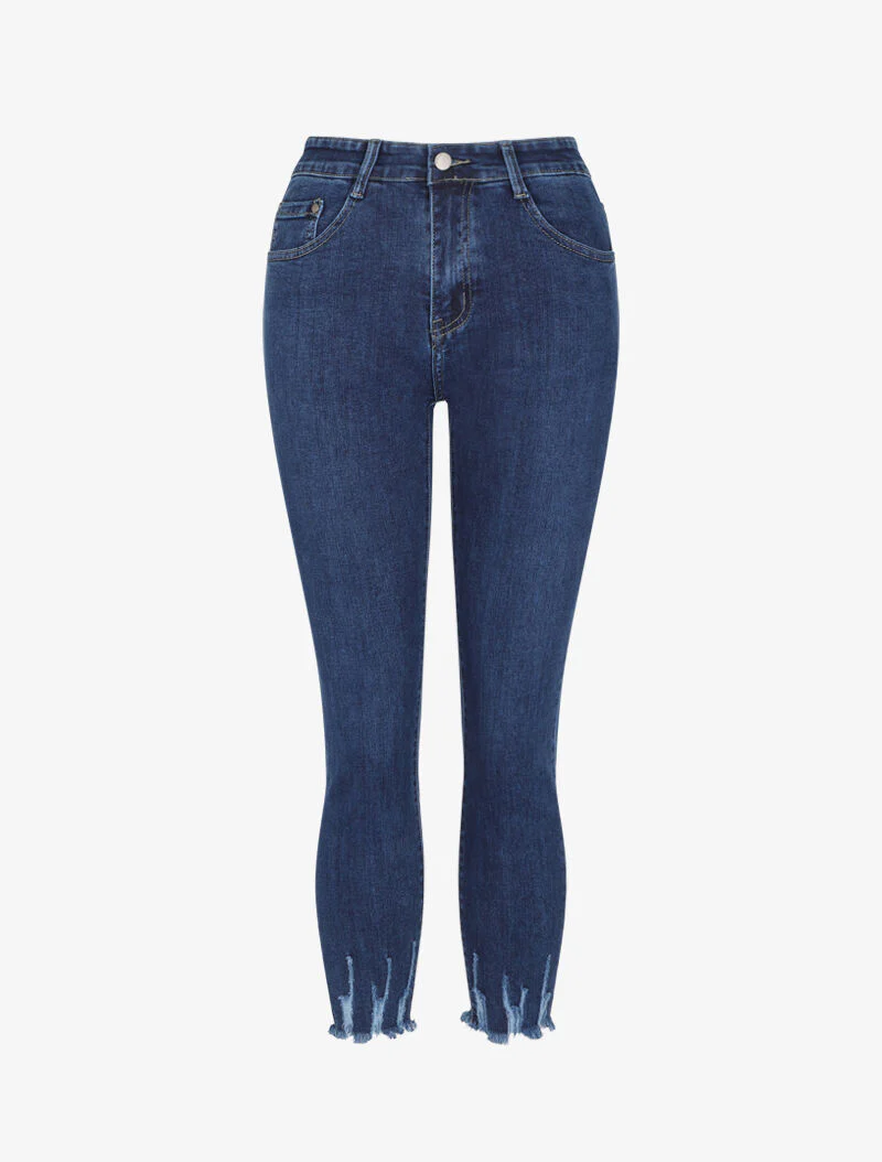Slim fit jeans met rafelige 7/8 lengte en krassende randen - Blauw denim