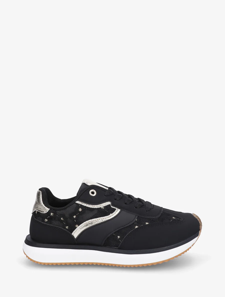 Sneakers van imitatieleer met margrietmotief - Zwart