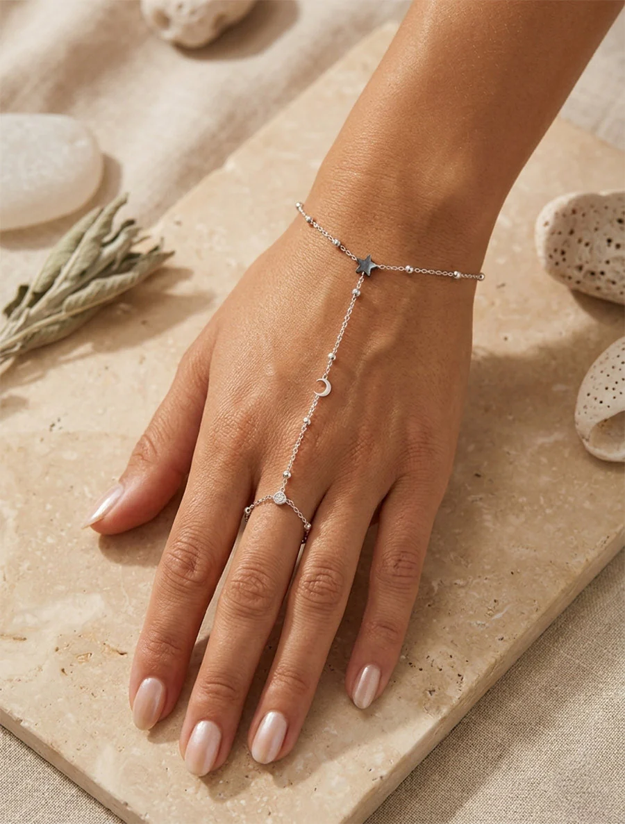 Sterren- en halve maanhandketting met een witte zirkonia - Geld