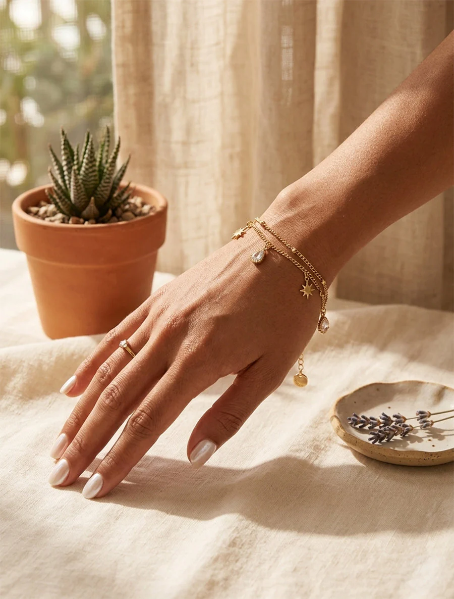 Sterrenarmband en druppels versierd met witte zirkoonstenen - Goud