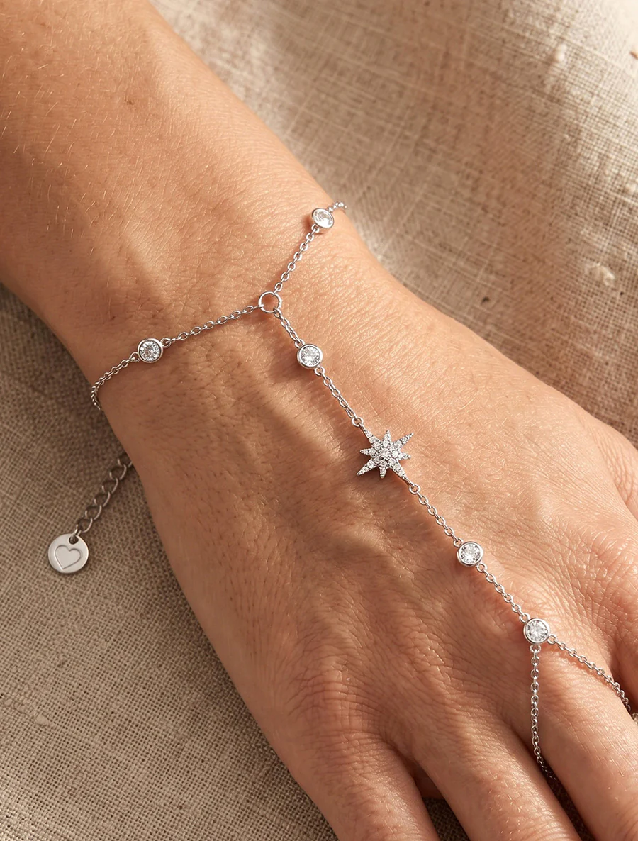 Stervormige armband met witte zirkonia's - Geld